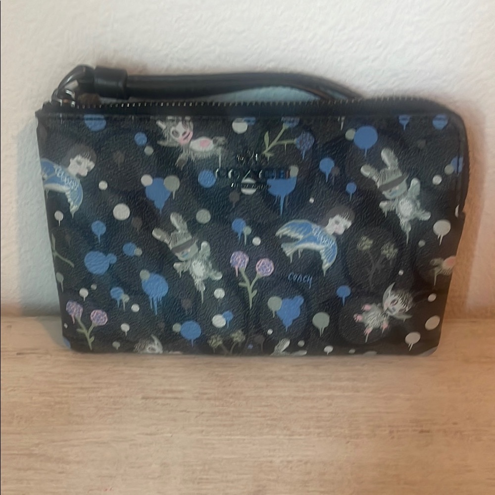 Rare Gary Baseman x Coach Limited Edition wristlet.